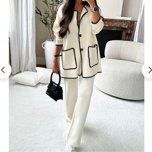 Elegant Cream Cardigan with Black Trim
